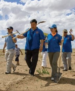 Mongolian Rotarians from the Rotary Club of Tuul head out to plant trees as part of the Keep Mongolia Green project in the Choir Eco Park near Choir, Govisumber, Mongolia.